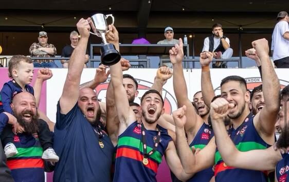 Northern Saints players celebrate a premiership win